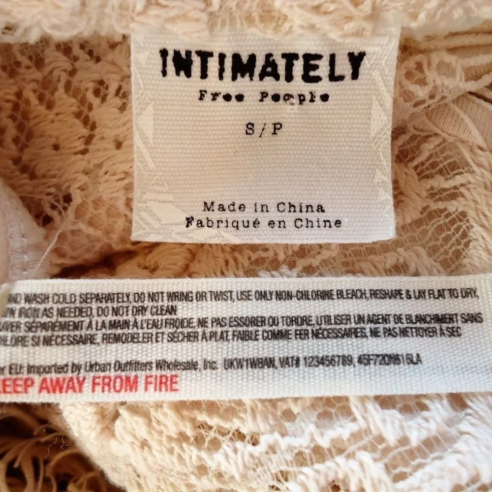 NWOT FREE PEOPLE SMALL 4/6 PEEK-A-BOO LACE DRESS